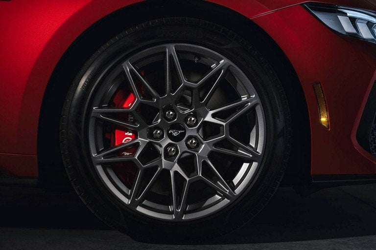 2024 Ford Mustang® model with a close-up of a wheel and brake caliper | Bailey Toliver Ford in Stanton TX