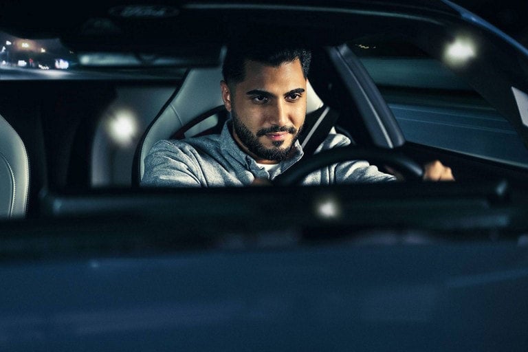 Person sitting in the driver’s seat of a parked 2024 Ford Mustang® coupe | Bailey Toliver Ford in Stanton TX